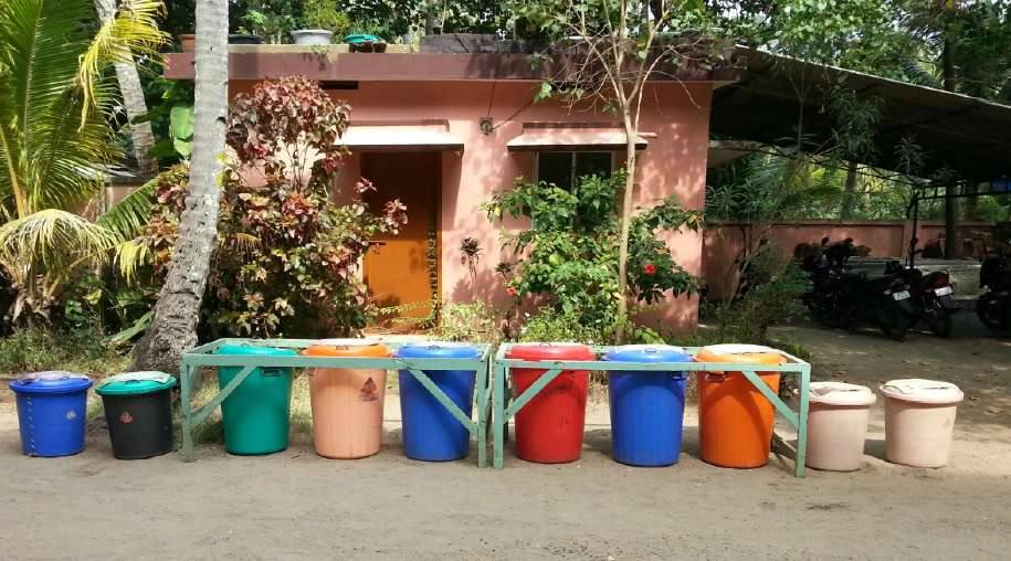 Row of colour-coded waste bins